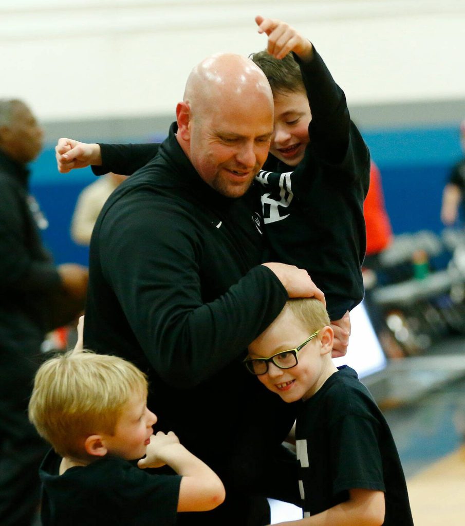 Edmonds College head coach Kyle Gray celebrates a win over Everett Community College on Wednesday, Feb. 7, 2024, at Seaview Gym in Lynnwood, Washington. (Ryan Berry / The Herald)