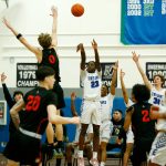 Edmonds Colleges Josiah Pierre puts up a three against Everett Community College on Wednesday, Feb. 7, 2024, at Seaview Gym in Lynnwood, Washington. (Ryan Berry / The Herald)