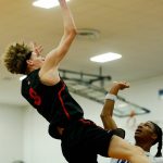 Everett Community Colleges Hayden Conaxis takes an off-balance shot against Edmonds College on Wednesday, Feb. 7, 2024, at Seaview Gym in Lynnwood, Washington. (Ryan Berry / The Herald)
