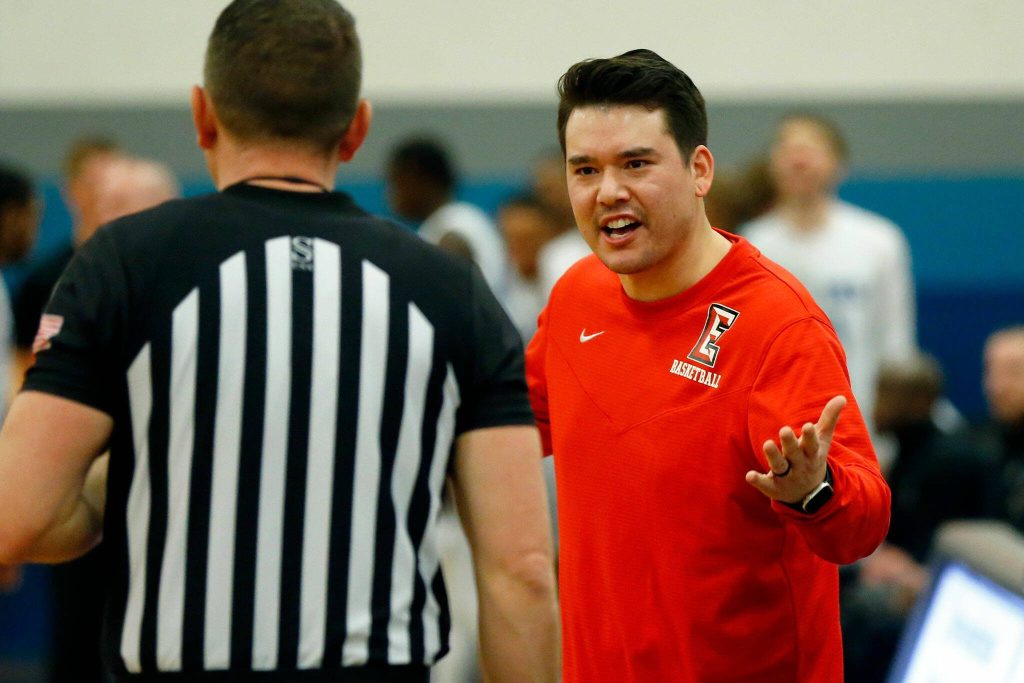 Everett Community College head coach Daniel Thompson talks to a referee about a foul called during a game against Edmonds College on Wednesday, Feb. 7, 2024, at Seaview Gym in Lynnwood, Washington. (Ryan Berry / The Herald)