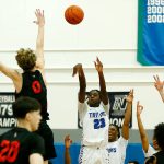 Edmonds College’s Josiah Pierre puts up a three against Everett Community College on Wednesday, Feb. 7, 2024, at Seaview Gym in Lynnwood, Washington. (Ryan Berry / The Herald)