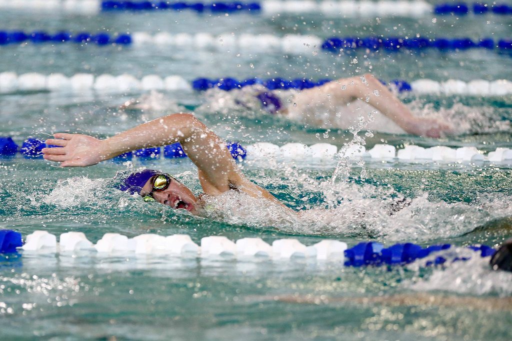 Kamiak senior Bryan Zi Wong takes first in the 500 yard freestyle during the WESCO 4A Boys Swim and Dive meet Saturday, Feb. 10, 2024, at the Snohomish Aquatic Center in Snohomish, Washington. (Ryan Berry / The Herald)