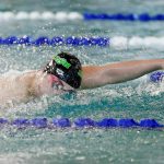 Jackson senior Ethan Georgiev swims in the 100-yard freestyle during the Class 4A District 1 swim and dive championships Saturday at the Snohomish Aquatic Center in Snohomish. (Ryan Berry / The Herald)