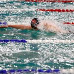 Snohomish junior Torsten Hokanson swims his way to a school and district record in the 100 yard freestyle with a time of 46.45 seconds during the Class 3A District 1 swim and dive meet Saturday at the Snohomish Aquatic Center in Snohomish. (Ryan Berry / The Herald)