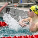 Shorecrest junior Colton Stoecker celebrates a come-from-behind win in the 200-yard freestyle during the Class 3A District 1 swim and dive meet Saturday at the Snohomish Aquatic Center in Snohomish. (Ryan Berry / The Herald)