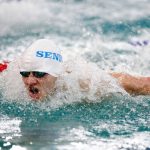 A Shorewood swimmer swims the butterfly during the 200 yard medley relay during the Class 3A District 1 swim and dive meet Saturday at the Snohomish Aquatic Center in Snohomish. (Ryan Berry / The Herald)