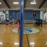 Half of a gym is used for physical education class while the other serves as a makeshift lunch station at the Sultan Elementary School on Wednesday, Jan. 24, 2024 in Sultan, Washington. Students have to walk to the gym to pick up food and then eat in their classrooms. (Annie Barker / The Herald)