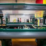 Children walk to get a drink where half of a gym is used for physical education class while the other serves as a makeshift lunch station at the Sultan Elementary School on Wednesday, Jan. 24, 2024 in Sultan, Washington. Students have to walk to the gym to pick up food and then eat in their classrooms. (Annie Barker / The Herald)