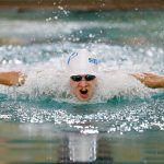 Shorewoods Larson Buchholz swims in the 100-yard butterfly during the 3A District 1 championship meet Feb. 10 at the Snohomish Aquatic Center in Snohomish. (Ryan Berry / The Herald)