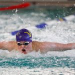 Lake Stevens junior Coren Coe swims in the 100-yard butterfly during the 4A District 1 championship meet Feb. 10 at the Snohomish Aquatic Center in Snohomish. (Ryan Berry / The Herald)