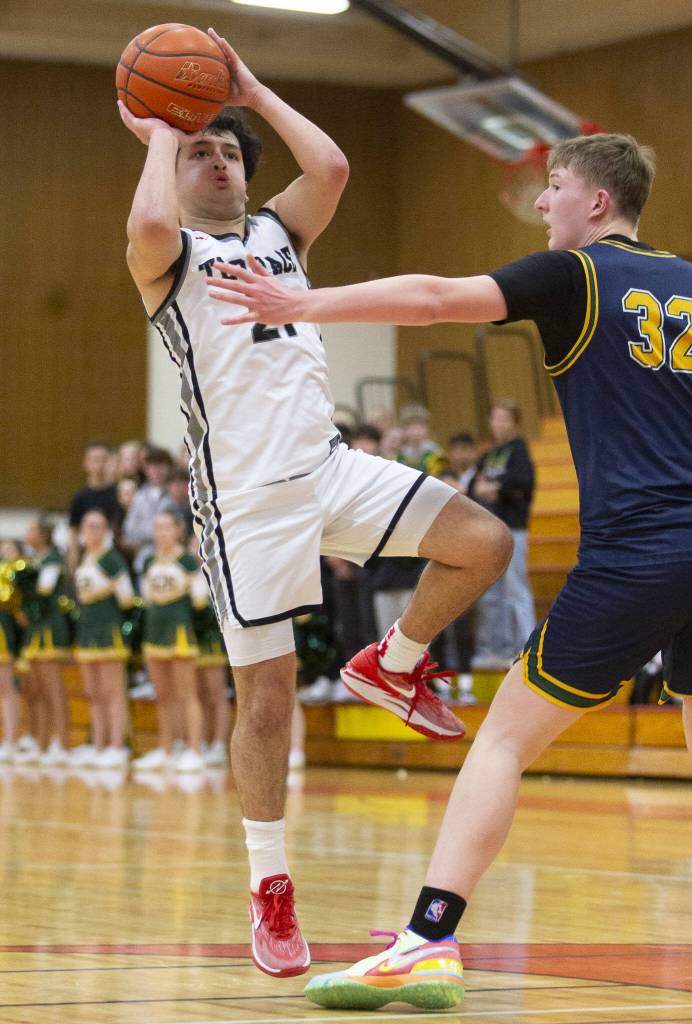 Mountlake Terraces Logan Tews makes a jump shot during the game against Shorecrest on Tuesday, Feb. 13, 2024 in Marysville, Washington. (Olivia Vanni / The Herald)