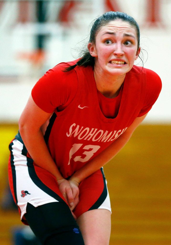 Snohomishs Sienna Capelli makes a face after hitting her hand on an opposing player against Meadowdale during the 3A District One Semifinals on Wednesday, Feb. 14, 2024, at Marysville Pilchuck High School in Marysville, Washington. (Ryan Berry / The Herald)