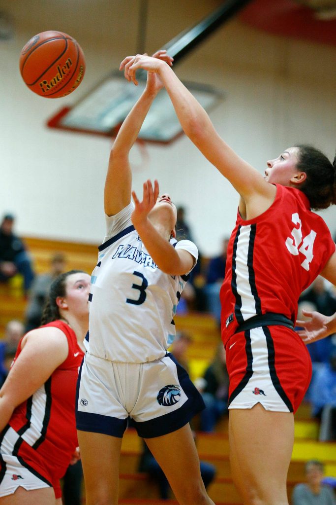 Snohomishs Tyler Gildersleeve-Stiles records a block against Meadowdale during the 3A District One Semifinals on Wednesday, Feb. 14, 2024, at Marysville Pilchuck High School in Marysville, Washington. (Ryan Berry / The Herald)