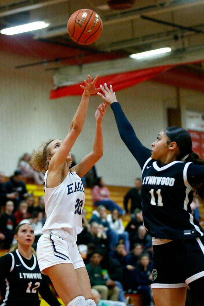 Arlingtons Samara Morrow puts up a midrange jumper against Lynnwood during the 3A District One Semifinals on Wednesday, Feb. 14, 2024, at Marysville Pilchuck High School in Marysville, Washington. (Ryan Berry / The Herald)