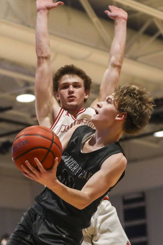 Glacier Peaks Reed Nagel (11) shoots the ball during a boys Class 4A bi-district title game between Glacier Peak and Mount Si at North Creek High School on Friday, Feb. 16, 2024 in Bothell, Washington. The Wildcats won, 59-53.(Annie Barker / The Herald)