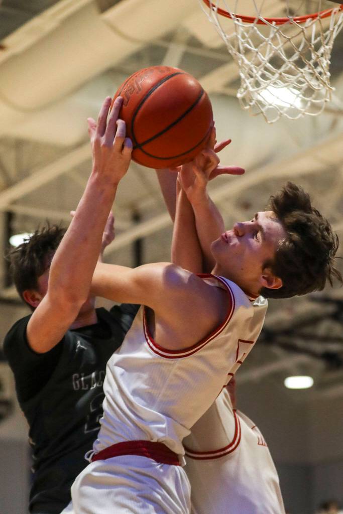 Mount Sis Jack Taylor (5) shoots the ball during a boys Class 4A bi-district title game between Glacier Peak and Mount Si at North Creek High School on Friday, Feb. 16, 2024 in Bothell, Washington. The Wildcats won, 59-53.(Annie Barker / The Herald)