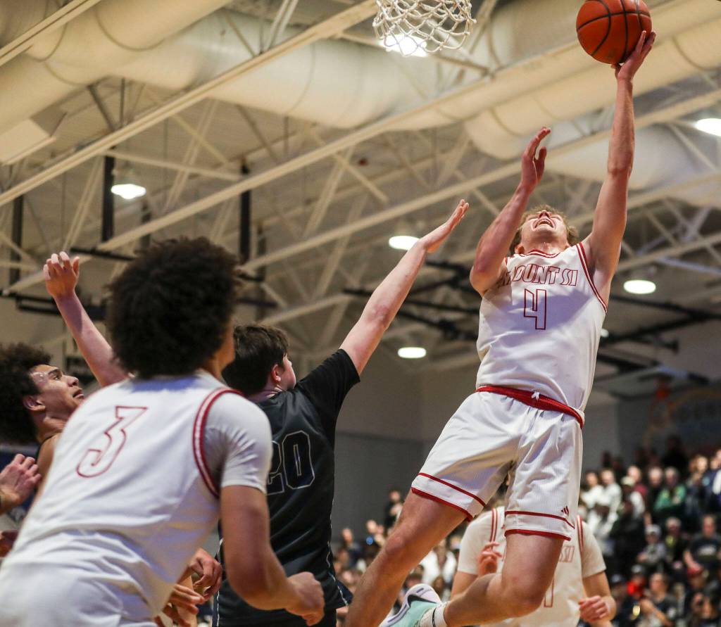 Mount Sis Trevor Hennig (4) shoots the ball during a boys Class 4A bi-district title game between Glacier Peak and Mount Si at North Creek High School on Friday, Feb. 16, 2024 in Bothell, Washington. The Wildcats won, 59-53.(Annie Barker / The Herald)