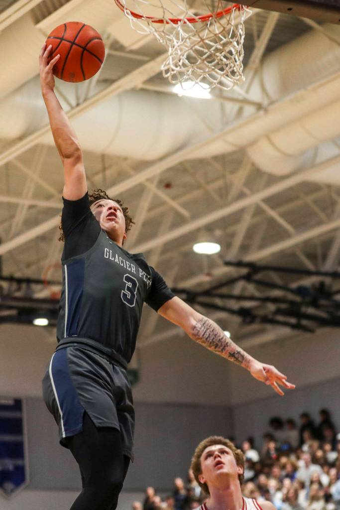 Glacier Peaks Isaiah Cuellar (3) shoots the ball during a boys Class 4A bi-district title game between Glacier Peak and Mount Si at North Creek High School on Friday, Feb. 16, 2024 in Bothell, Washington. The Wildcats won, 59-53.(Annie Barker / The Herald)