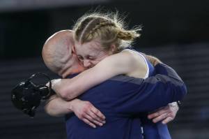 Glacier Peak’s Karianne Baldwin celebrates winning the 4A/3A girls 125-pound championship match during Mat Classic XXXV on Saturday, Feb. 17, 2024, at the Tacoma Dome in Tacoma. (Annie Barker / The Herald)