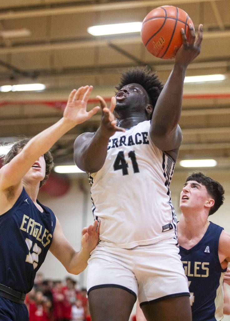 Mountlake Terraces Zaveon Jones attempts a layup during the 3A boys district championship game against Arlington on Saturday, Feb. 17, 2024 in Marysville, Washington. (Olivia Vanni / The Herald)