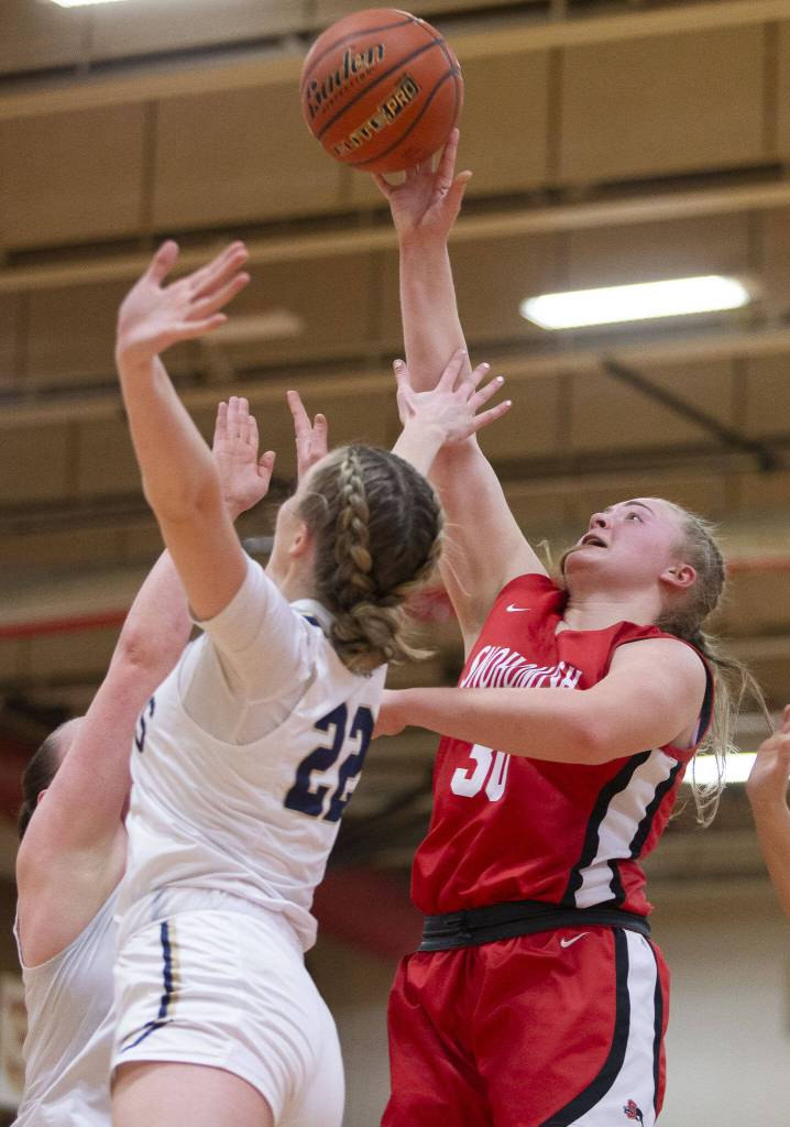 Snohomishs Catherine Greene attempts a layup during the 3A girls district championship game against Arlington on Saturday, Feb. 17, 2024 in Marysville, Washington. (Olivia Vanni / The Herald)