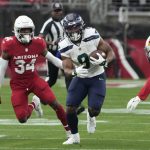 Seattle Seahawks running back Kenneth Walker III (9) during the first half of a game against the Arizona Cardinals on Jan. 8 in Glendale, Ariz. (AP Photo/Rick Scuteri)