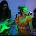 Local band Narrow Tarot perform as a crowd builds at Lucky Dime during the opening night of Fisherman’s Village on Thursday, May 18, 2023, in downtown Everett, Washington. (Ryan Berry / The Herald)