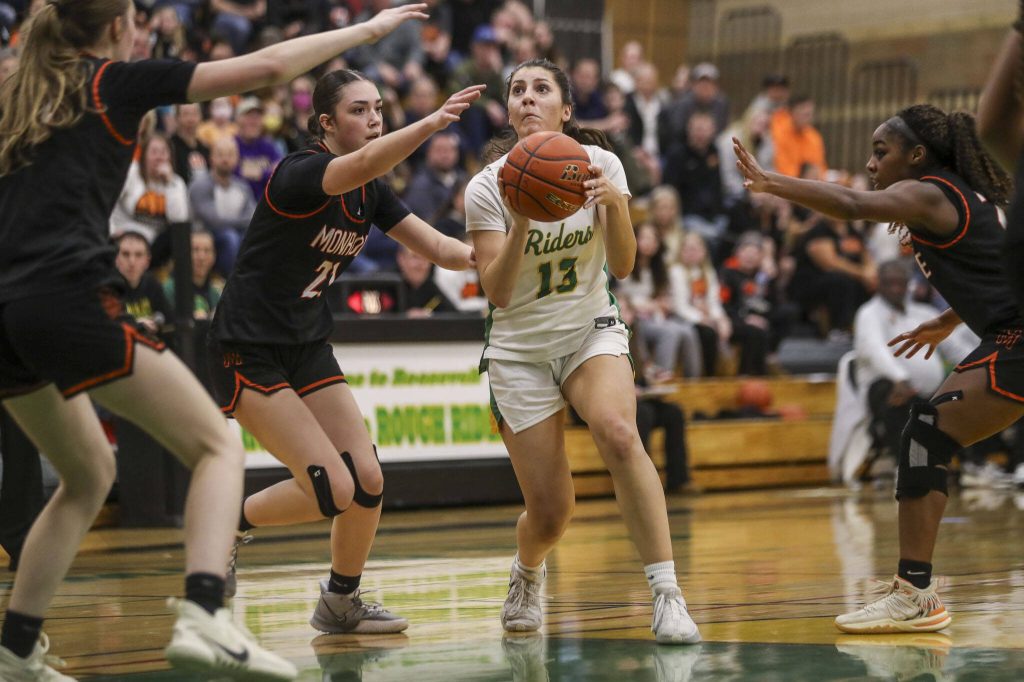 Roosevelt s Clara Swanson (13) shoots the ball during a 3A girls game between Monroe and Roosevelt at Roosevelt High School on Tuesday, Feb. 20, 2024, in Seattle, WA. Monroe fell, 58-37. (Annie Barker / The Herald)