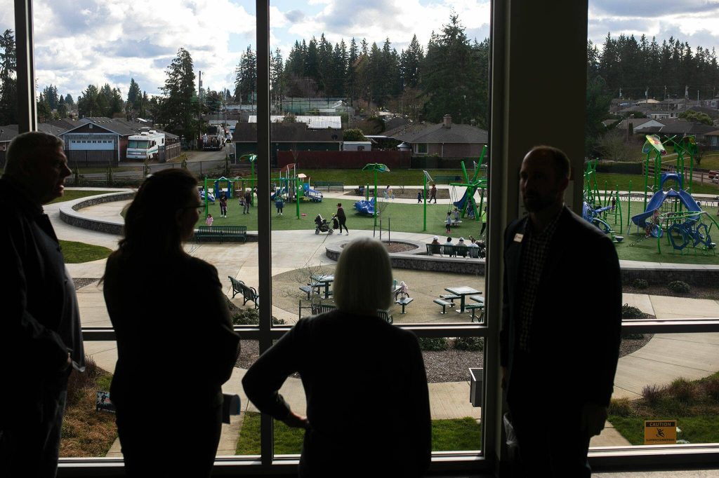 Sen. Patty Murray looks over the playground outside the Everett YMCA during a tour of the facility Thursday, Feb. 22, 2024, in Everett, Washington. (Ryan Berry / The Herald)