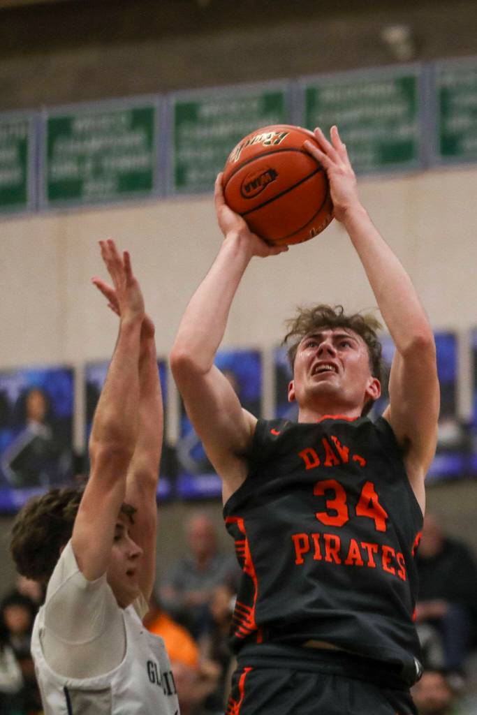 Davis Finnegan Anderson (34) shoots the ball during a boys game between Glacier Peak and Davis at Shorewood High School on Friday, Feb. 23, 2024, in Shoreline, WA. Glacier Peak fell, 65-54.. (Annie Barker / The Herald)