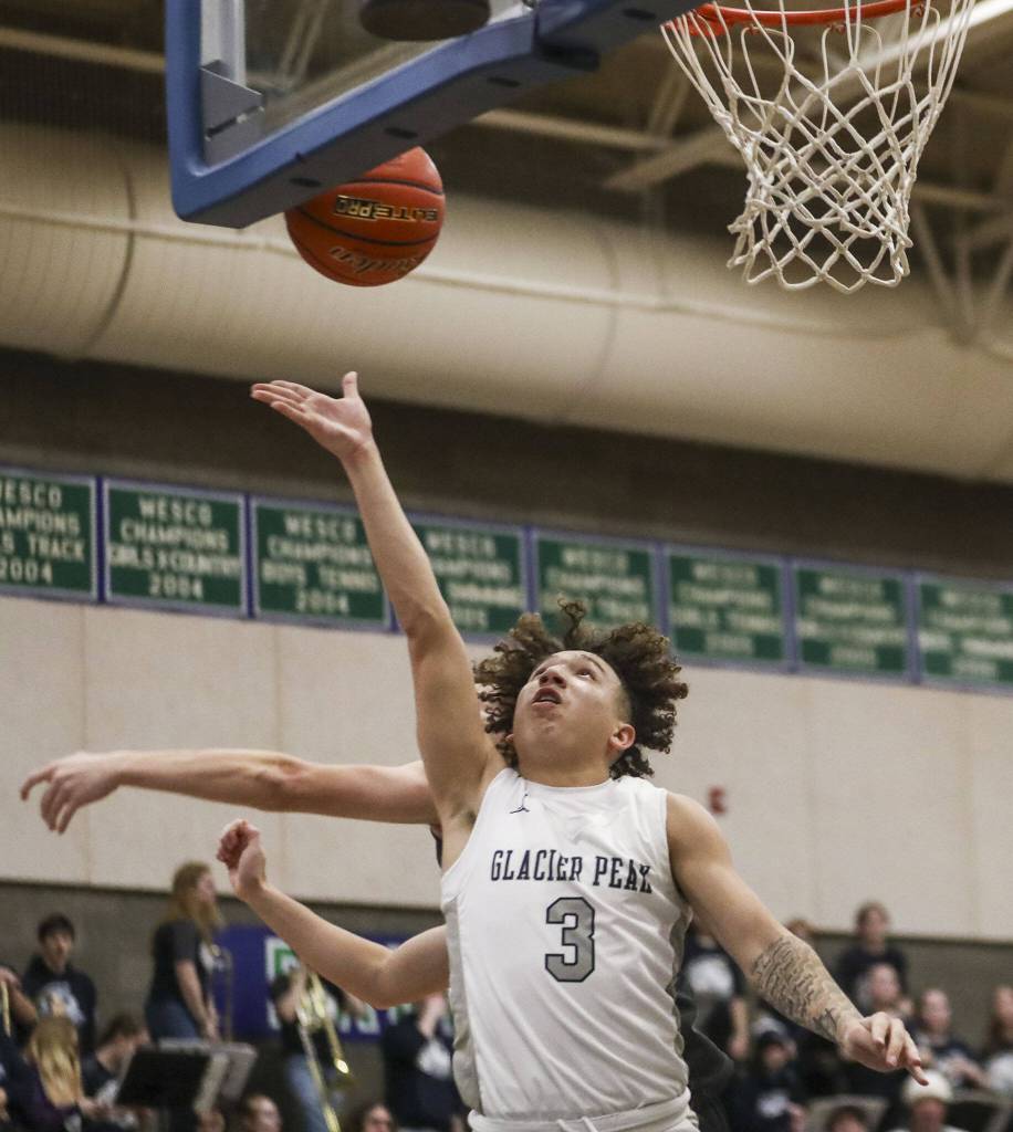 Glacier Peaks Isaiah Cuellar (3) shoots the ball during a boys game between Glacier Peak and Davis at Shorewood High School on Friday, Feb. 23, 2024, in Shoreline, WA. Glacier Peak fell, 65-54.. (Annie Barker / The Herald)