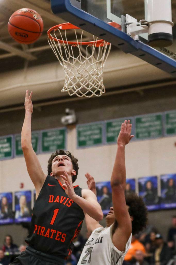 Davis Brandon Lee (1) shoots the ball during a boys game between Glacier Peak and Davis at Shorewood High School on Friday, Feb. 23, 2024, in Shoreline, WA. Glacier Peak fell, 65-54.. (Annie Barker / The Herald)