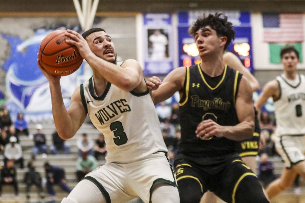 Jacksons Trey Hawkins (3) shoots the ball during a boys game between Jackson and Puyallup at Shorewood High School on Friday, Feb. 23, 2024, in Shoreline, WA. Jackson won, 55-48. (Annie Barker / The Herald)
