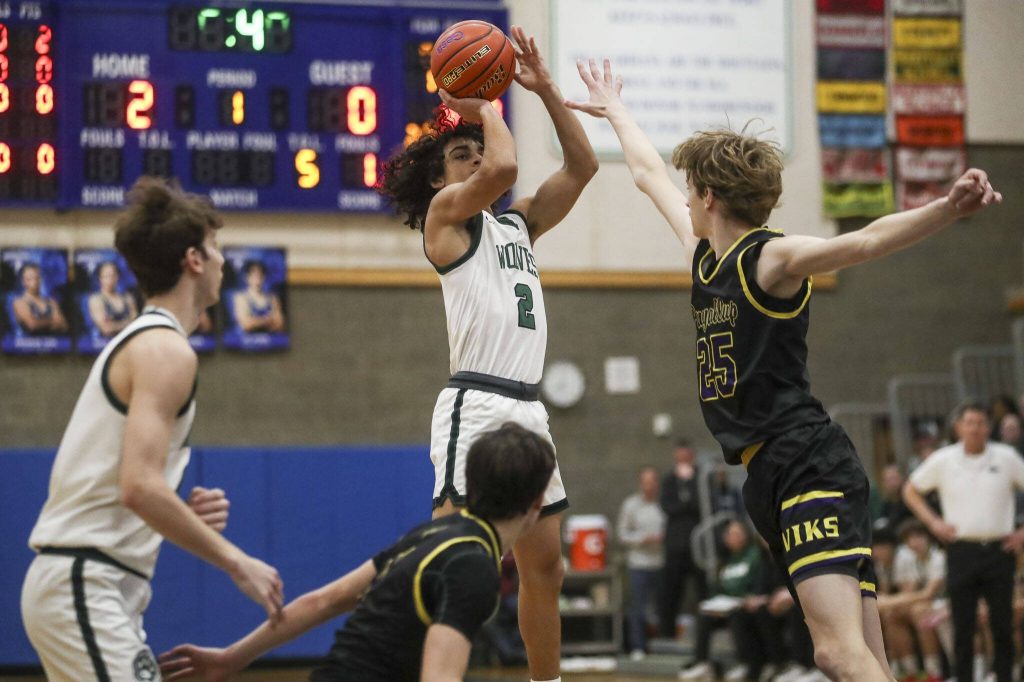 Jacksons Seamus Williams (2) shoots the ball during a boys game between Jackson and Puyallup at Shorewood High School on Friday, Feb. 23, 2024, in Shoreline, WA. Jackson won, 55-48. (Annie Barker / The Herald)