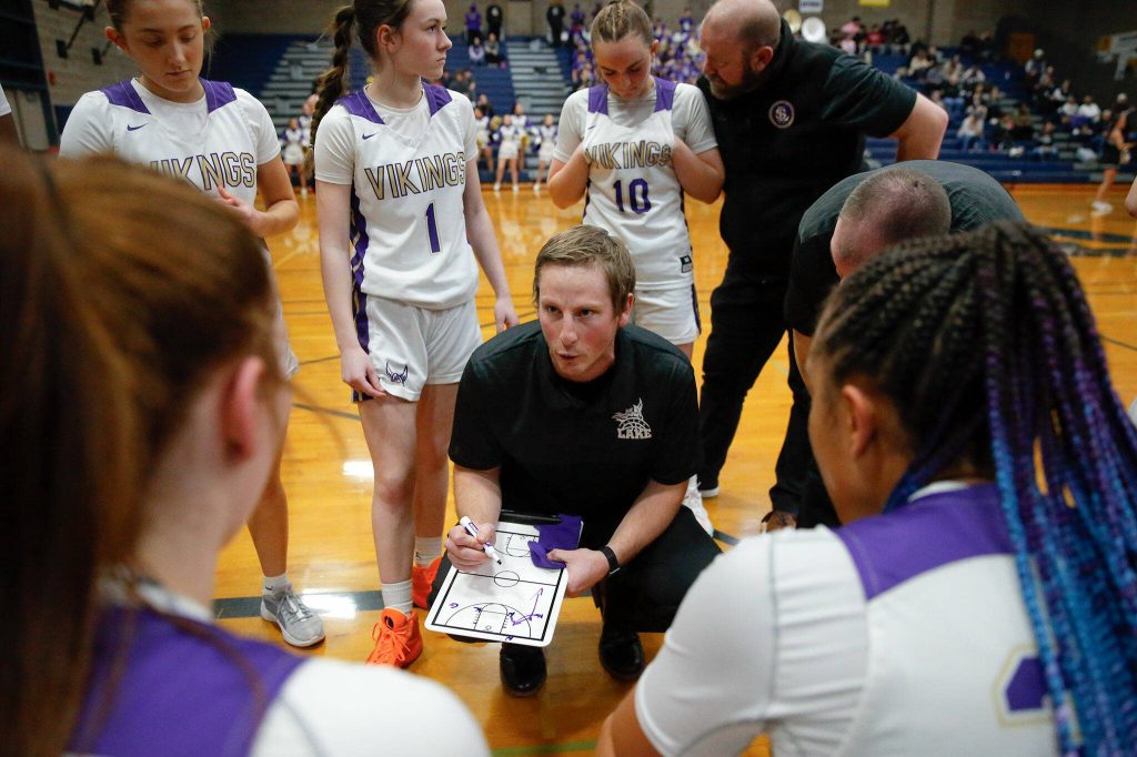Lake Stevens head coach Seth Dodge draws up a play for his team in the waning minutes of a playoff matchup against Skyview at Arlington High School on Friday, Feb. 23, 2024, in Arlington, Washington. (Ryan Berry / The Herald)