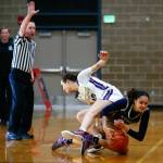 Lake Stevens Kendel Kuhl ties up an opponent and forces a jump ball against Skyview during a playoff matchup at Arlington High School on Friday, Feb. 23, 2024, in Arlington, Washington. (Ryan Berry / The Herald)