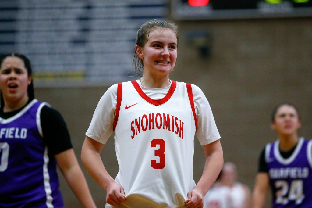 Snohomishs Kendall Hammer makes a face after being sent to the line with only a few seconds left against Garfield during a playoff matchup at Arlington High School on Friday, Feb. 23, 2024, in Arlington, Washington. (Ryan Berry / The Herald)