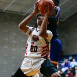 Tulalip Heritages Jaylan Gray gets fouled on a shot against Columbia Adventist Academy during a playoff matchup at Arlington High School on Saturday, Feb. 24, 2024, in Arlington, Washington. (Ryan Berry / The Herald)