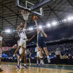 Arlingtons Billy Kooy attempts a layup during the 3A boys state basketball game against Garfield on Wednesday, Feb. 28, 2024 in Tacoma, Washington. (Olivia Vanni / The Herald)