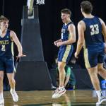 Arlingtons Jacoby Falor reacts to Arlington taking the lead during the 3A boys state basketball game against Garfield on Wednesday, Feb. 28, 2024 in Tacoma, Washington. (Olivia Vanni / The Herald)