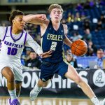 Arlington’s Leyton Martin takes the ball down the court during the 3A boys state basketball game against Garfield on Wednesday, Feb. 28, 2024 in Tacoma, Washington. (Olivia Vanni / The Herald)