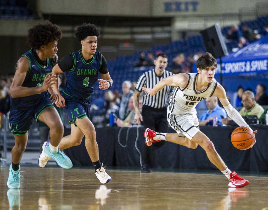 Mountlake Terraces Jaxon Dubiel takes the ball down the court during the 3A boys state basketball game against Todd Beamer on Wednesday, Feb. 28, 2024 in Tacoma, Washington. (Olivia Vanni / The Herald)