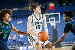 Mountlake Terrace’s Jaxon Dubiel looks for a teammate to pass too while being guarded during the 3A boys state basketball game against Todd Beamer on Wednesday, Feb. 28, 2024 in Tacoma, Washington. (Olivia Vanni / The Herald)