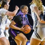 Lake Stevens Nisa Ellis looks for an open teammate to pass to during the 4A girls state basketball game against Gonzaga Prep on Wednesday, Feb. 28, 2024 in Tacoma, Washington. (Olivia Vanni / The Herald)
