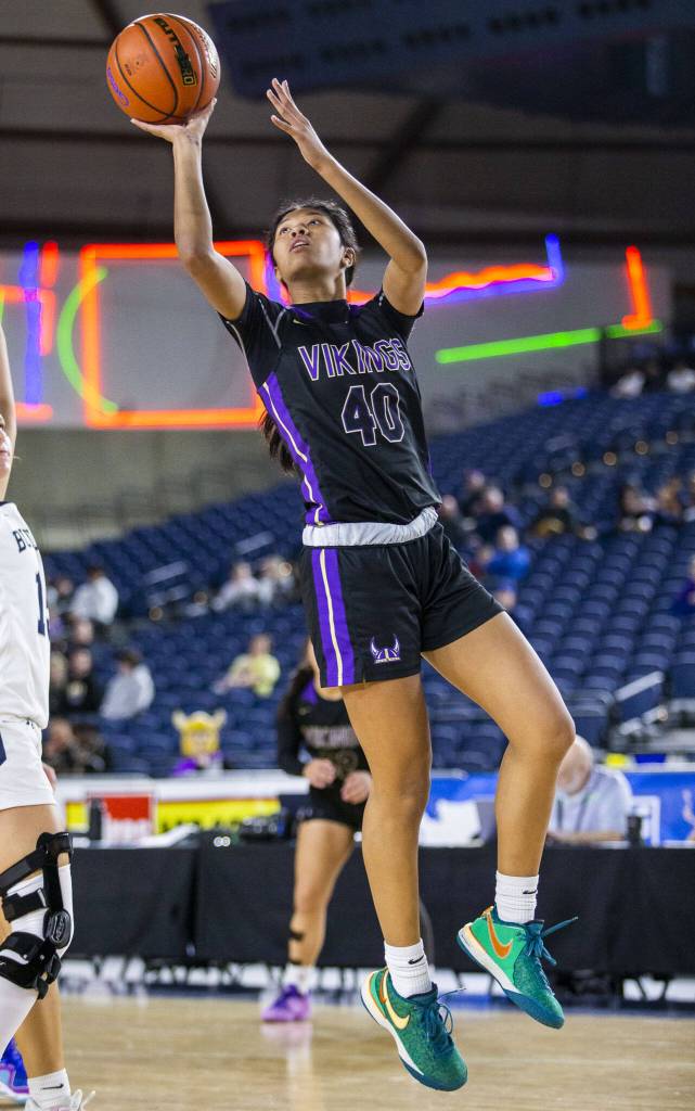 Lake Stevens Noelani Tupua attempts a jump shot during the 4A girls state basketball game against Gonzaga Prep on Wednesday, Feb. 28, 2024 in Tacoma, Washington. (Olivia Vanni / The Herald)