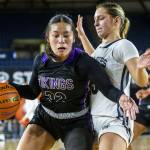 Lake Stevens Keira Tupua maneuvers around a Gonzaga Prep player during the 4A girls state basketball game on Wednesday, Feb. 28, 2024 in Tacoma, Washington. (Olivia Vanni / The Herald)
