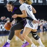 Lake Stevens Keira Tupua maneuvers around a Gonzaga Prep player during the 4A girls state basketball game on Wednesday, Feb. 28, 2024 in Tacoma, Washington. (Olivia Vanni / The Herald)