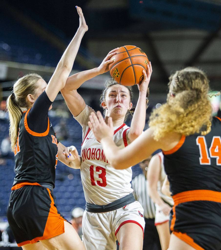 Snohomishs Sienna Capelli looks for an open shot during the 3A girls state basketball game against Kennewick on Wednesday, Feb. 28, 2024 in Tacoma, Washington. (Olivia Vanni / The Herald)