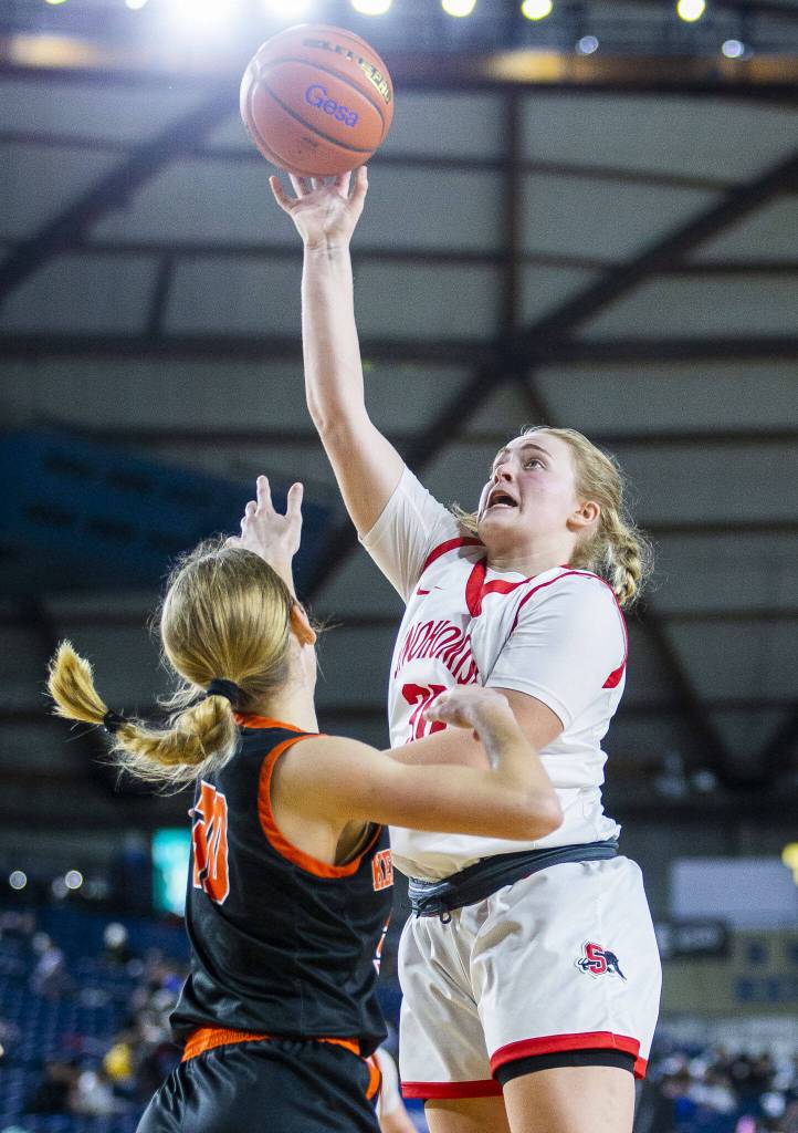 Snohomishs Catherine Greene attempts a layup during the 3A girls state basketball game against Kennewick on Wednesday, Feb. 28, 2024 in Tacoma, Washington. (Olivia Vanni / The Herald)