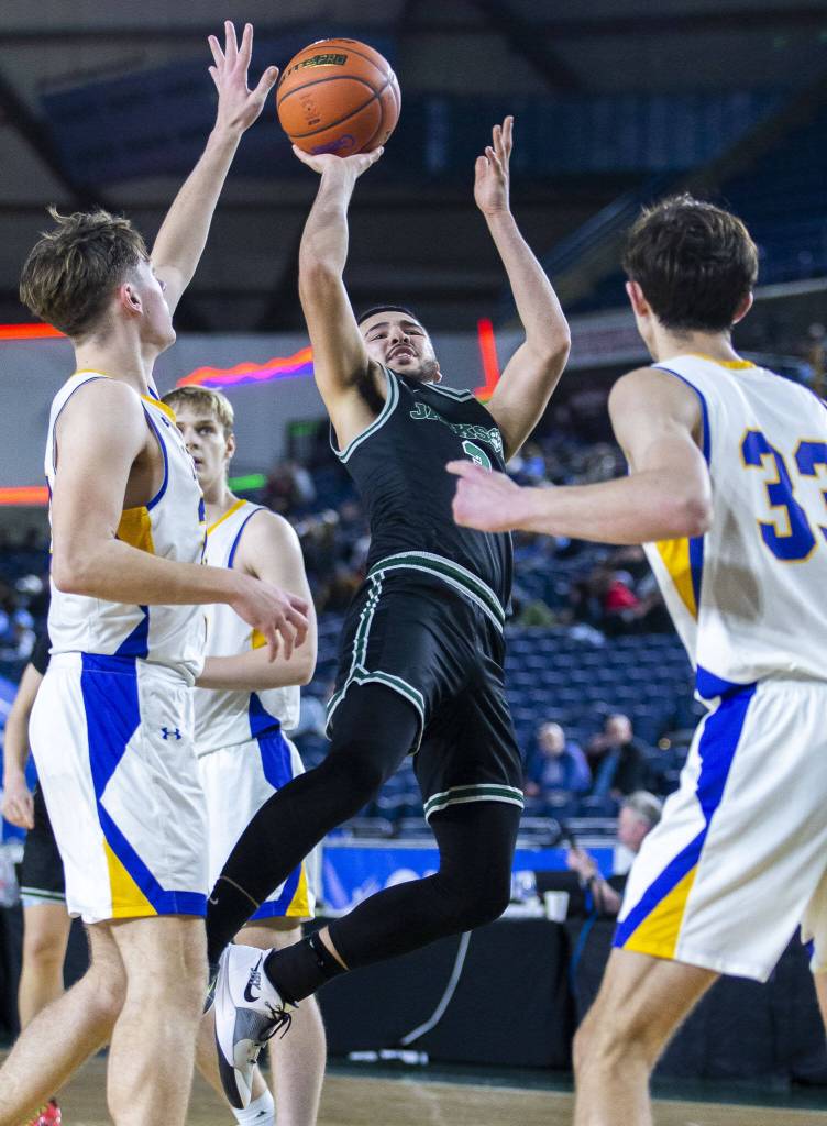 Jacksons Trey Hawkins attempts a jump shot during the 4A boys state basketball game against Tahoma on Wednesday, Feb. 28, 2024 in Tacoma, Washington. (Olivia Vanni / The Herald)